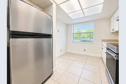 8982 W Sample Rd #204, Coral Springs, FL 33065 - Photo 7