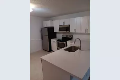 10161 W Sunrise #104, Plantation, FL 33322 - Photo 1