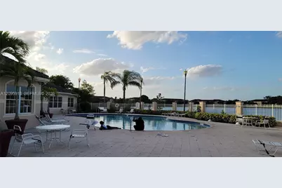 5001 Wiles Rd #207, Coconut Creek, FL 33073 - Photo 3
