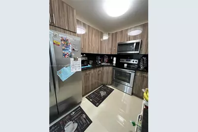 1055 W 77th St #311, Hialeah, FL 33014 - Photo 11