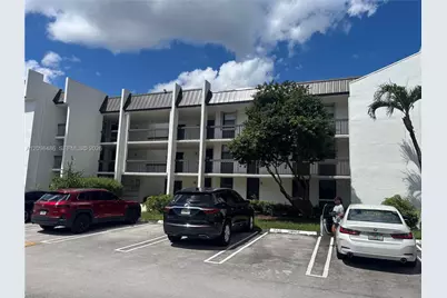 8441 Forest Hills Dr #203, Coral Springs, FL 33065 - Photo 1