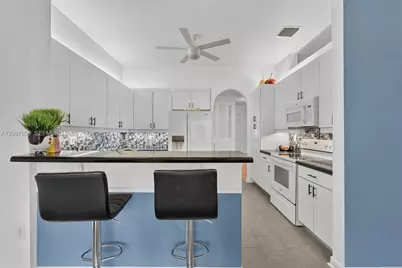 7932 E Exeter Blvd E #202, Tamarac, FL 33321 - Photo 13