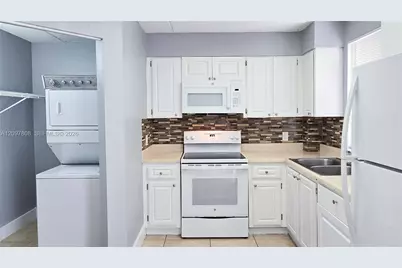 6065 NW 186th St #207, Hialeah, FL 33015 - Photo 1