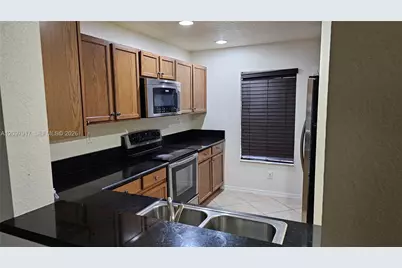 5931 Glasgow Way #5931, Tamarac, FL 33321 - Photo 11