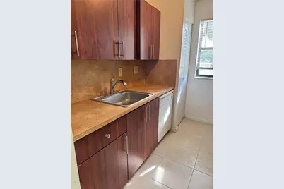 7070 NW 179th St #105, Hialeah, FL 33015 - Photo 1