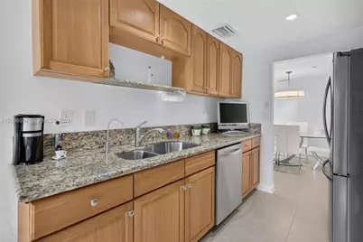 9901 Fairway Cove Ln, Plantation, FL 33324 - Photo 17