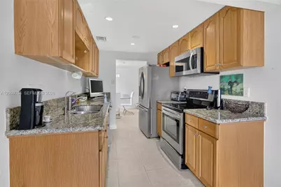 9901 Fairway Cove Ln, Plantation, FL 33324 - Photo 15