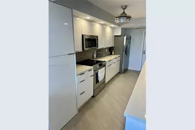 100 Golden Isles Dr #205, Hallandale Beach, FL 33009 - Photo 5