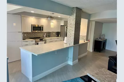 100 Golden Isles Dr #205, Hallandale Beach, FL 33009 - Photo 11