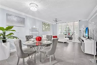 9090 Lime Bay Blvd #209, Tamarac, FL 33321 - Photo 1