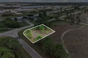 1254 Devore Street E, Lehigh Acres, FL 33974 - Photo 1