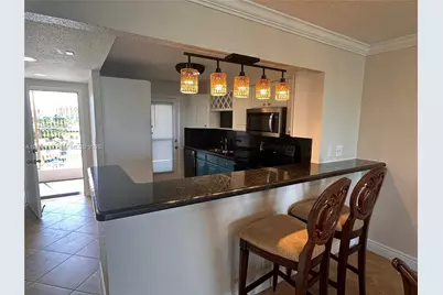 400 Golden Isles Dr #40, Hallandale Beach, FL 33009 - Photo 5