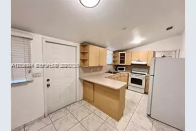 1674 NE 174th St #Rear, North Miami Beach, FL 33162 - Photo 1