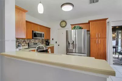 9561 Bradshaw Ln, Tamarac, FL 33321 - Photo 17