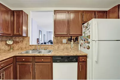 10777 W Sample Rd #616, Coral Springs, FL 33065 - Photo 11