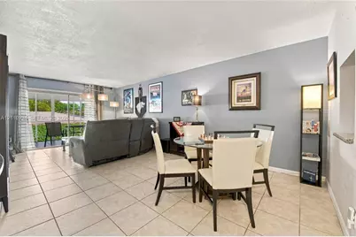 8605 W Sample Rd #211, Coral Springs, FL 33065 - Photo 11