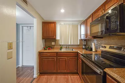 8821 Sunrise Lakes Blvd #102, Sunrise, FL 33322 - Photo 9