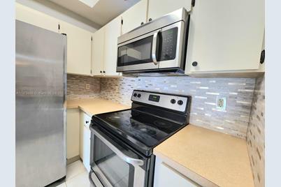 7320 NW 114th Ave #101, Doral, FL 33178 - Photo 1