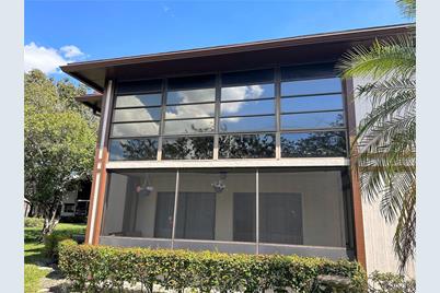 9690 S Belfort Cir #H4, Tamarac, FL 33321 - Photo 1