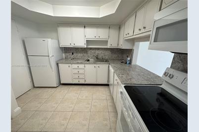 1400 NE 169th St #110, Miami, FL 33162 - Photo 1
