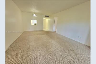 6150 NW 62nd St #107 - Photo 1