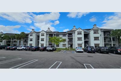 11211 W Atlantic Blvd #104, Coral Springs, FL 33071 - Photo 1