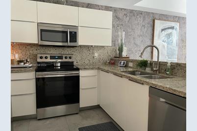 10902 NW 83rd St #212 - Photo 1