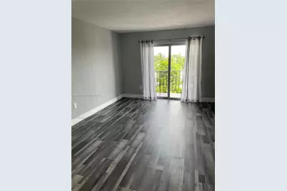 3075 NW 7th St #302, Miami, FL 33125 - Photo 1