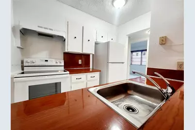 1225 NE 124th St #29C, North Miami, FL 33161 - Photo 1