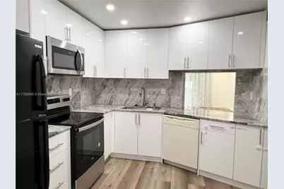1750 NE 191st St #111-2, Miami, FL 33179 - Photo 1