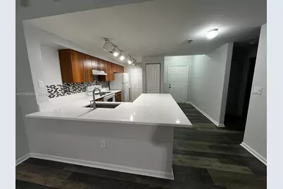 5900 W Sample Rd #303, Coral Springs, FL 33067 - Photo 1