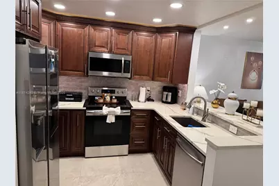 7100 NW 17th St #404, Plantation, FL 33313 - Photo 1