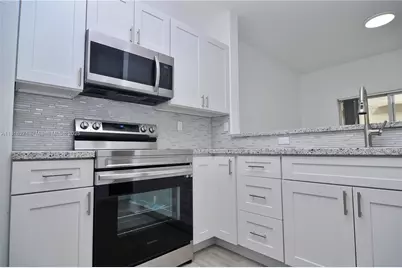 1658 SE 28th Ct #104, Homestead, FL 33035 - Photo 1