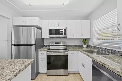 8305 Sunrise Lakes Blvd #101, Sunrise, FL 33322 - Photo 1