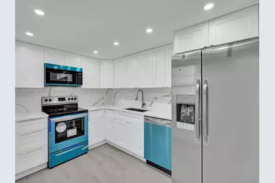 3700 Oaks Clubhouse Dr #203, Pompano Beach, FL 33069 - Photo 1