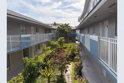 8360 NW 103rd St #207E, Hialeah Gardens, FL 33016 - Photo 1