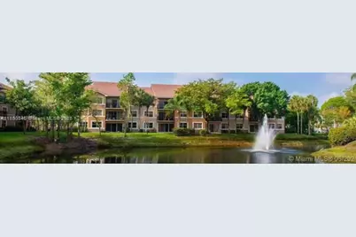 8955 Wiles Rd #201, Coral Springs, FL 33067 - Photo 1