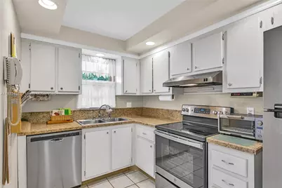 2420 Deer Creek Country Club Blvd #203-D, Deerfield Beach, FL 33442 - Photo 1