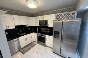 900 NE 195th St, Miami, FL 33179 - Photo 1