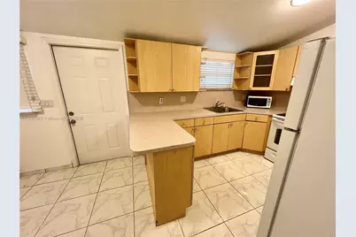 1674 NE 174th St #REAR, North Miami Beach, FL 33162 - Photo 1