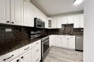 6039 Collins Ave, Miami Beach, FL 33140 - Photo 1