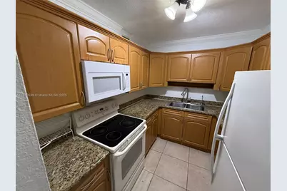 1815 W 56th St #106, Hialeah, FL 33012 - Photo 1