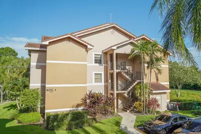 9033 Wiles Rd #304, Coral Springs, FL 33067 - Photo 1