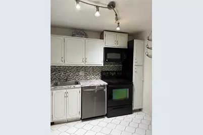 8390 Sands Point Blvd #F106, Tamarac, FL 33321 - Photo 1