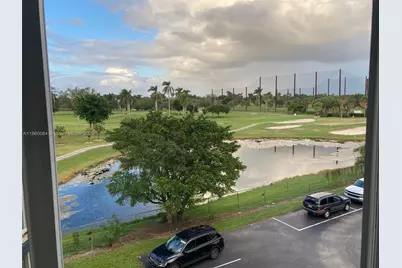 6995 NW 186th St #E403, Hialeah, FL 33015 - Photo 1