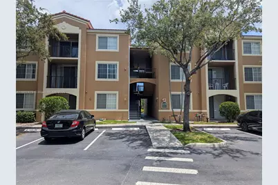 8070 N Nob Hill Rd #203, Tamarac, FL 33321 - Photo 1