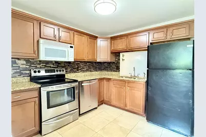 5495 NW 10th Ct #104, Plantation, FL 33313 - Photo 1