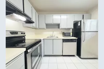 704 Gardens Dr #104, Pompano Beach, FL 33069 - Photo 1