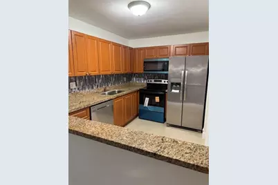 6130 W 19th Ave #301, Hialeah, FL 33012 - Photo 1