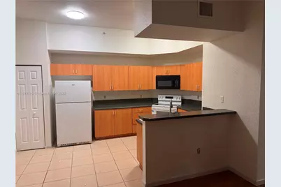 2851 Riverside Dr #203-N, Coral Springs, FL 33065 - Photo 1